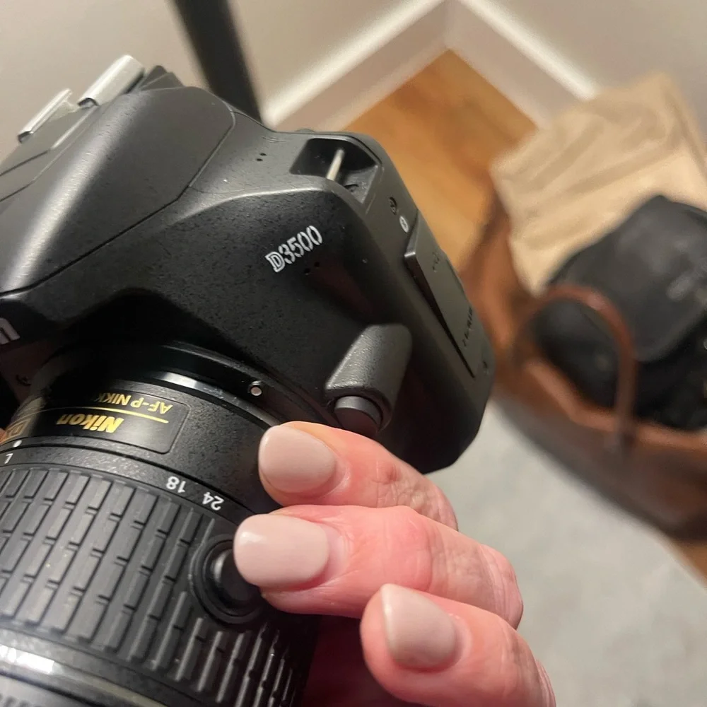 Nikon Black and Red DSLR Camera